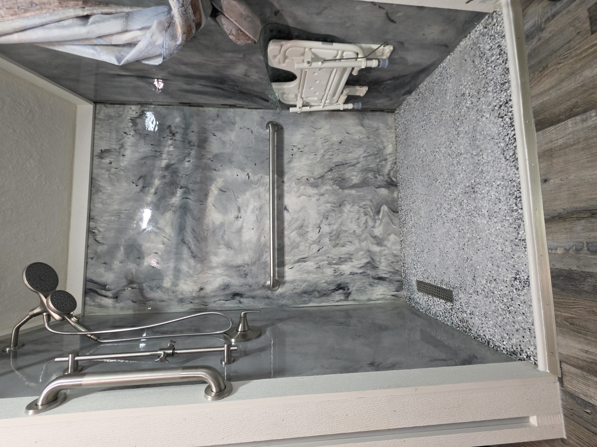 Brickyard custom composite shower with gray marble-look walls