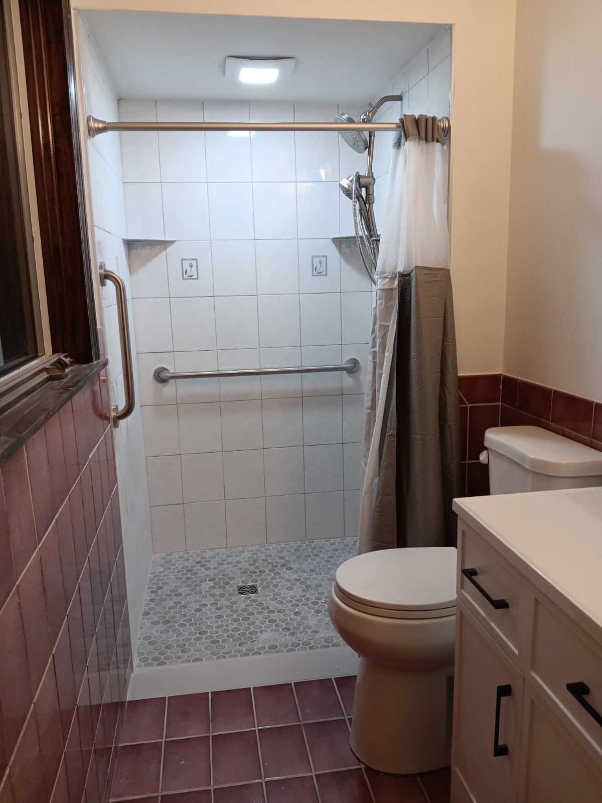Completed Brickyard bathroom modification with safety and accessibility fixtures